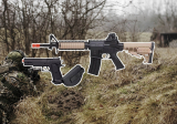 What ammunition do Airsoft pistols use?